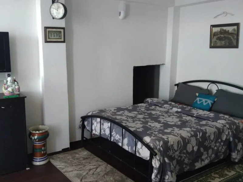Queen size bed with suite plus attached toilet